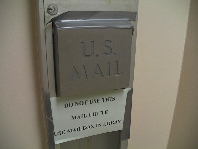 File:Entry hole in a disused Cutler mail chute in Clifton, NJ.JPG