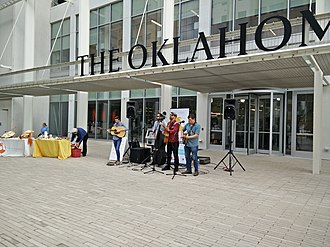 A band plays outside of The Oklahoman's Oklahoma City headquarters. Exterior of The Oklahoma's Downtown Oklahoma City Headquarters.jpg