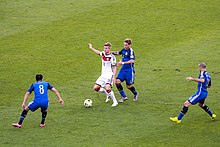 Kroos während des WM-Finals 2014 gegen Enzo Pérez, Lucas Biglia und Javier Mascherano (von links)