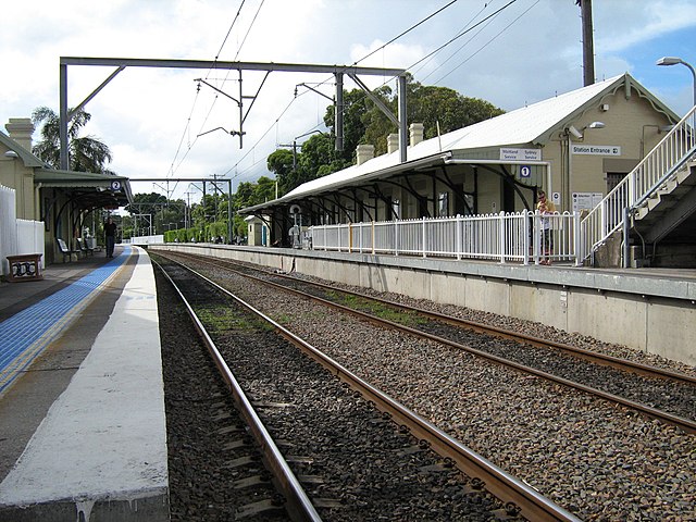 Platform-level view of the Newcastle railway line as it runs through Hamilton