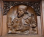 English: Detail from the choir stalls at the Stiftskirche in Herrenberg. Left side of the choir. Made by Heinrich Schickhardt der Ältere 1513-1517