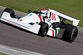 1975 Hesketh 308C driven at Barber Motorsports Park. The car lacked any sponsorship and featured the flags of England and Scotland