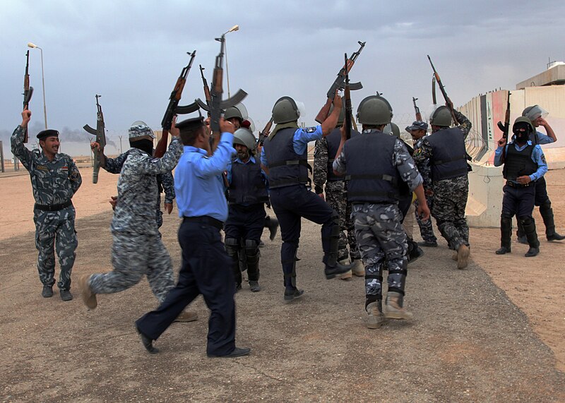 File:Iraqi police students celebrate passing a building clearing test at a police academy in Basra, Iraq, April 20, 2011 110420-A-YD132-169.jpg