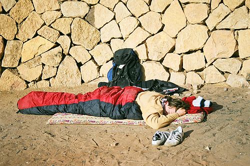 A person in a sleeping bag