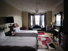 A suite in the hotel prior to its 2010s and 2020s renovation JuniorSuite.JPG