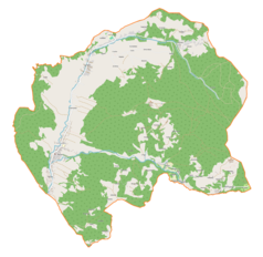 Mapa konturowa gminy Koszarawa, po lewej znajduje się punkt z opisem „Parafia Świętego Karola Boromeusza”