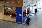 English: lux-airport information desk, departure hall Luxembourg Findel Airport.