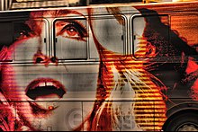 A Madonna painting on a van in Brazil (2008). Madonna's face in a bus.jpg