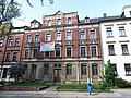 Apartment building in closed development with front garden