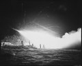 Night view of the First Rocket Battery, 11th Marine Regiment, firing a night mission, somewhere in the Marines front... - NARA - 532427.tif