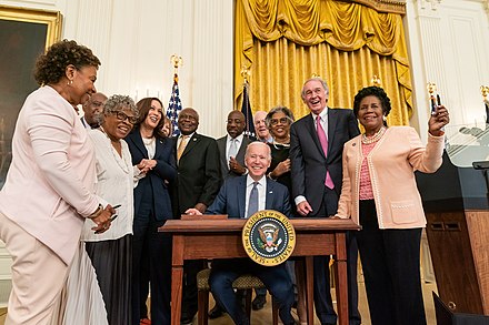 Senator Warnock during the signing of Juneteenth National Independence Day Act, June 17, 2021
