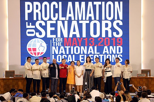 Revilla (1st from the left) during the proclamation of the winning twelve senators by the Commission on Elections on May 22, 2019.