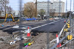 An overview of tarmacking progress along Guildhall Road at Queen's Gardens in Kingston upon Hull, which is partway through major renovation works.