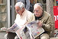 Reading the Morning Paper on Ben Yehuda Street - Jerusalem - Israel (5680692931).jpg