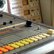 A Roland TR-808 drum machine and synthesizer,a predominant instrument on the album Roland TR-808 - the classic drum machine.jpg