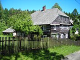 Jeden z domů v Polesí, části obce Rynoltice, okres Liberec.