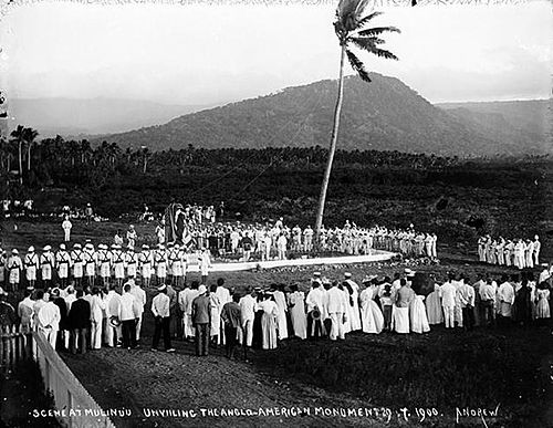 Unveiling of the Anglo-American Monument at Mulinu'u (1900), with Mount Vaea, the burial place of Robert Louis Stevenson, in the background. Scene.on.the.Mulinu'u.Peninsula,Upolu.Andrew.Thomas 1900.jpg