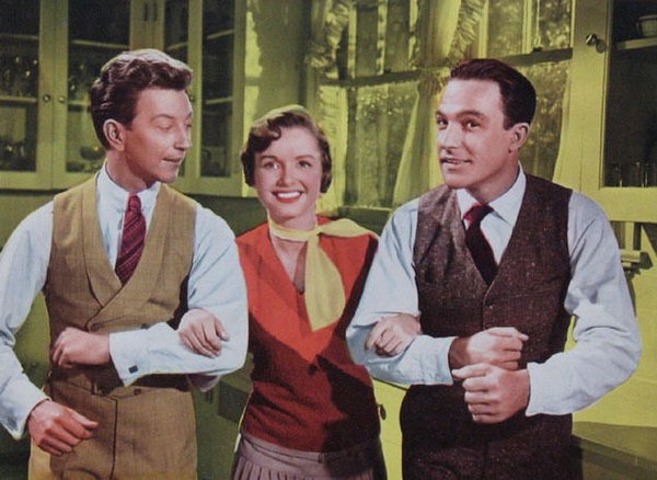 Donald O'Connor, Debbie Reynolds, and Gene Kelly from a lobby card for Singin' in the Rain