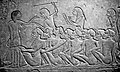 Marché aux esclaves de l'Égypte antique avec ses prisonniers nubiens en attente d'être vendus (XVIIIe dynastie) - Musée archéologique de Bologne.