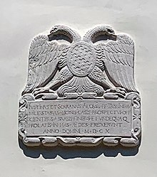 Targa in pietra del 1610 riportante lo stemma della famiglia Trissino posta all'ingresso di Villa Trissino Tretti