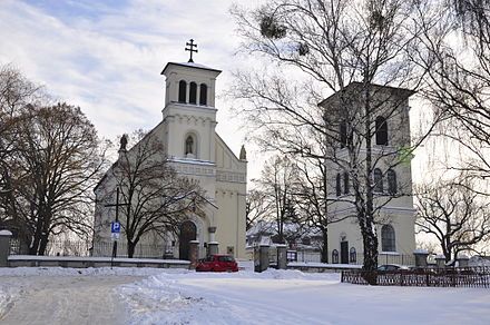 St. Catherine's church atop a small hill, seen in wintertime