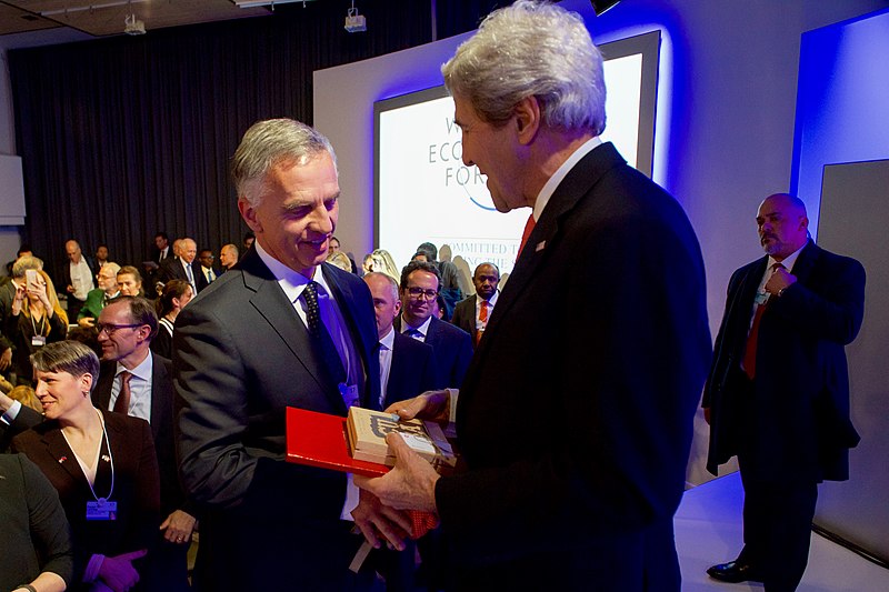 File:Switzerland Head of Department Foreign Affairs Burkhalter Presents Secretary Kerry Chocolate at the World Economic Forum in Davos (32368961345).jpg