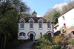 The Holy Well, where the water was first bottled on a commercial scale. The well is believed to be the oldest bottling plant in the world, and now bottles under the name Holywell Spring Water The Holy Well, Malvern Wells - geograph.org.uk - 395887.jpg