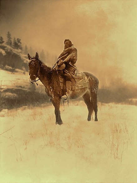 A faux orotone created in Photoshop by emulating the colors of actual orotone prints The Scout in Winter, Crow, 1908, Edward S. Curtis (restored III goldtone).jpg