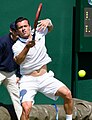 James McGee competing in the first round of the 2015 Wimbledon Qualifying Tournament at the Bank of England Sports Grounds in Roehampton, England. The winners of three rounds of competition qualify for the main draw of Wimbledon the following week.