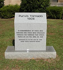 Front of the Centennial Tornado Marker, placed by the Lamar County Historical Society on the grounds of the Old Lamar County Courthouse. Tornado1908Front.jpg