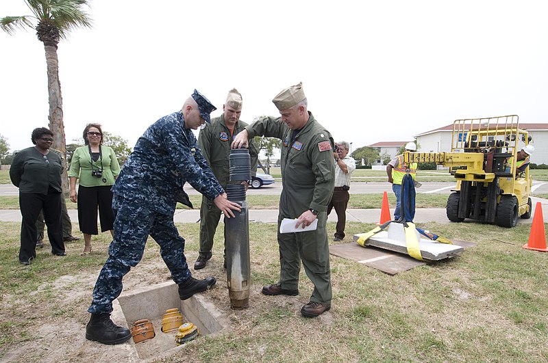 File:US Navy 110512-N-LY958-034 Cmdr. Daniel Case opens a 25-year-old time capsule (VT) 27 buried in 1986.jpg