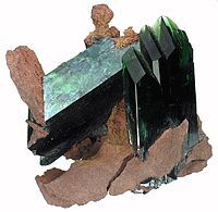 Grüner Vivianit aus der Tomokoni Mine, Potosí, Bolivien (Größe: 4,6 × 4,5 × 3,1 cm)