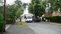 English: Wightbus 5881 (KE04 EAG), a Mercedes-Benz Sprinter/UVG, in Worsley Road, Gurnard, Isle of Wight, on route 32. It is about to pass the junction with The Avenue.