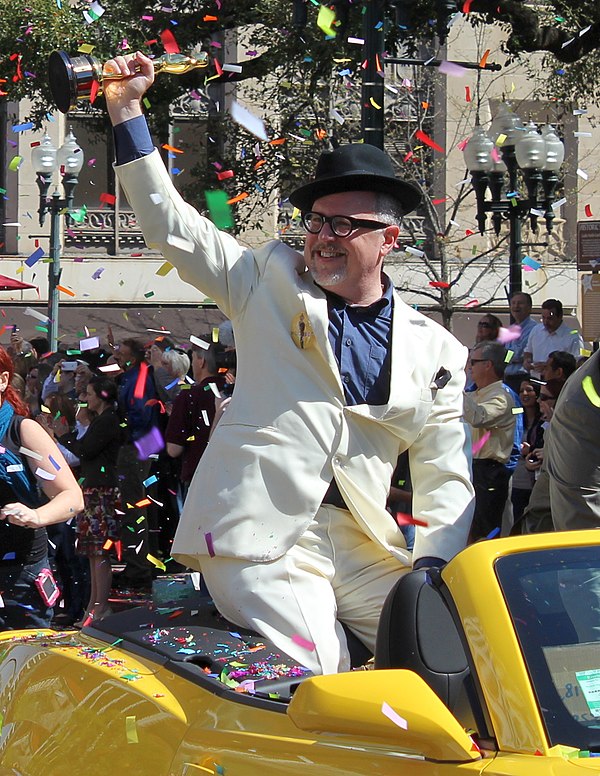 Joyce in March 2012 holding an Oscar for his short film The Fantastic Flying Books of Mr. Morris Lessmore during a parade in his and Brandon Oldenburg