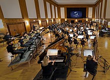 Recordings with the Synchron Stage Orchestra in the large recording hall "Stage A" of the Synchron Stage Vienna 2022. "Stage A" und Synchron Stage Orchestra.jpg