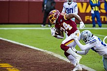 Gibson scoring a touchdown against the Dallas Cowboys in 2020 Antonio Gibson touchdown.jpg