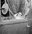 Dorothea Lange. Baby from Mississippi parked in truck at FSA Camp, Merrill, Oregon. October, 1939.