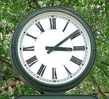 A typical clock face with Roman numerals in Bad Salzdetfurth, Germany BadSalzdetfurthBadenburgerStr060529.jpg