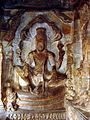 English: Vishnu seated upon the serpent Shesha, Cave 3, Badami Cave Temples, Karnataka, circa 6th Century CE, rock-cut sandstone sculpted in situ. Shesha is considered as both a servant and manifestation of Vishnu.