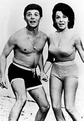 Frankie Avalon and Annette Funicello during the Beach Party film, Beach Blanket Bingo (1965) Beach Party Annette Funicello Frankie Avalon Mid-1960s.jpg