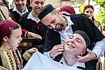 Thumbnail for File:Best man shaving the groom is part of the traditional Galichnik wedding.jpg