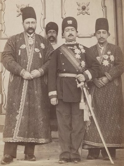 Mohammad Ali Shah Qajar with Mirza Mohammad Ebrahim Khan, the Mo'avin al-Dowleh, and Company, c. 1907