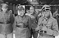 Yunanistan Ordusu, İtalya'ya teslim olmamak için ve sadece Almanya'ya teslim olmak için LSSAH Tugayı kumandanı Sepp Dietrich'e bir heyeti göndermiştir. (3 Mayıs 1941, Atina, arkasında Akropolise Hakenkreuz bayrağını diken 6. Dağ Tümeni kumandanı Ferdinand Schörner)