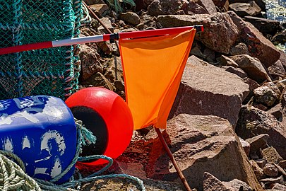 Buoys and flag for fishing nets in Norra Grundsund