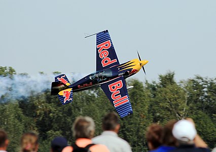 Show of acrobatic airplane Extra 300 on Czech Air show CIAF 2013 in Hradec Králové, Czech Republic