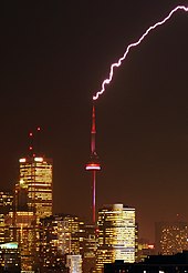Certain prominent structures often attract frequent lightning strikes. The CN Tower in Toronto is struck many times every summer. CN Tower struck by lightning-Edit(Taxi).jpg