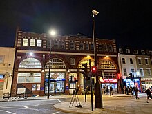 The Kentish Town road entrance at night in 2021 Camden Town tube station at night, August 2021.jpg