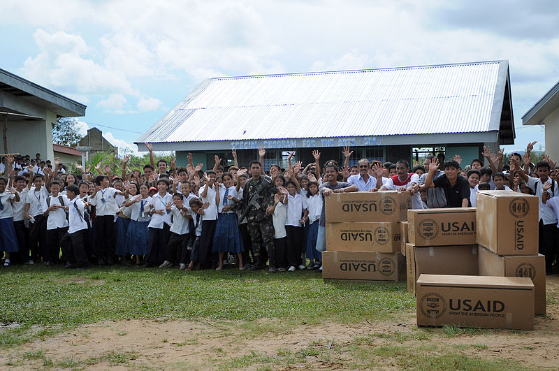 File:Children wave goodbye to the aircrew of an SH-60F Seahawk helicopter in Balasan, Philippines, July 1, 2008, after they delivered humanitarian supplies to their school 080701-N-HX866-012.jpg