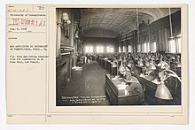 University of Pennsylvania students taking United States Navy examination for commission in McKean Hall at Penn Law in June 1918 College and Universities - University of Pennsylvania - War Activities at University of Pennsylvania; Philadelphia, Pennsylvania. U.S. Navy men taking examination for commission in McKean Hall, Law School - NARA - 26429803.jpg