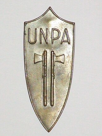 UNPA badge in use during the Italian Social Republic Distintivo Volontari UNPA - WWII.jpg